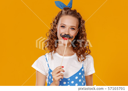 young beautiful funny girl with moustache on 57103701
