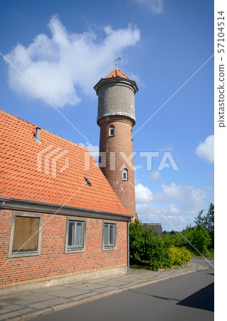 Tower on a city street made of red bricks Tower on a city street made of red bricks 57104514