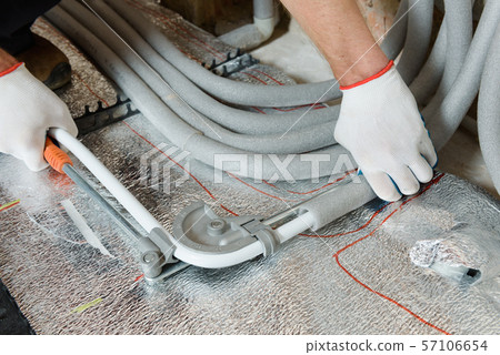 Installation of a warm floor. Installation of a warm floor. 57106654