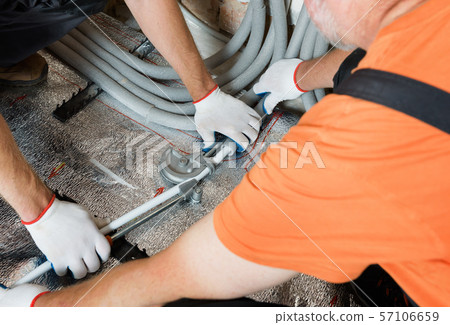 Installation of a warm floor. Installation of a warm floor. 57106659