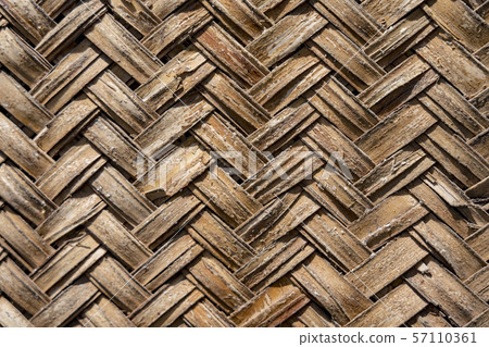 Blurred background texture of woven bamboo thatch Blurred background texture of woven bamboo thatch 57110361