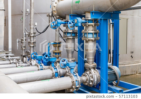 Water pump station and pipeline on roof deck of water tank for industrial work 57113103