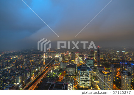 Yokohama cityscape in Japan Local heavy rain and thunderstorms. The surrounding sky was stained pale with dark clouds and flashes = observed from Yokohama city 57115277