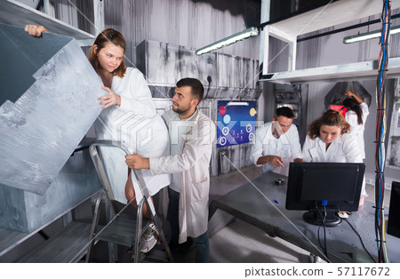 Adults in quest room 57117672