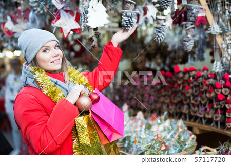 Girl shopping Christmas decorations Girl shopping Christmas decorations 57117720