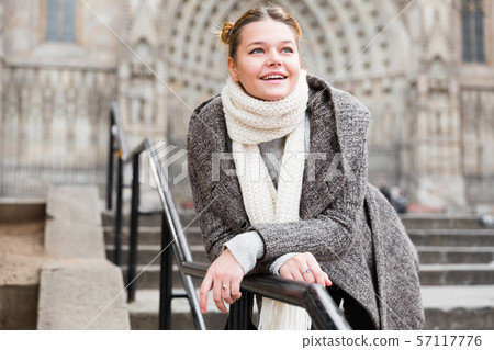 positive girl teenager in the city in scarf 57117776
