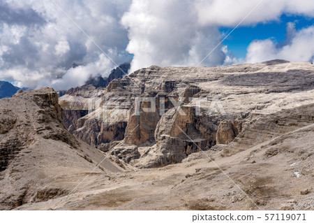 The Sass Pordoi is a relief of the Dolomites, in the Sella group, Italy The Sass Pordoi is a relief of the Dolomites, in the Sella group, Italy 57119071