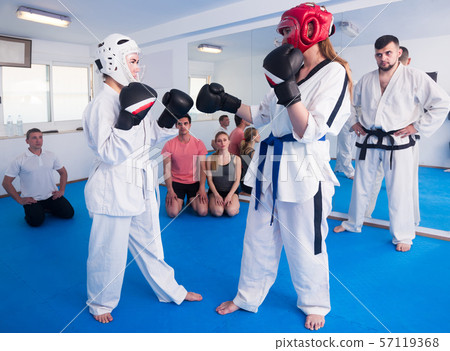 Female trainees conduct sparring 57119368
