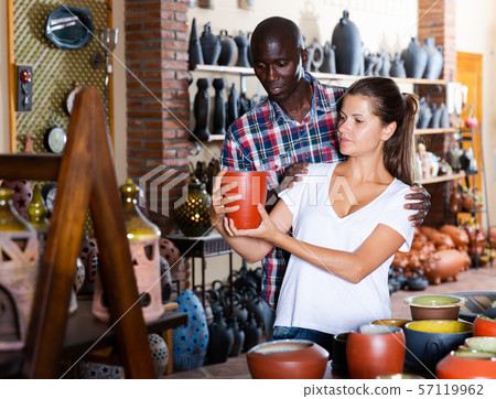 Couple choosing ceramic production 57119962
