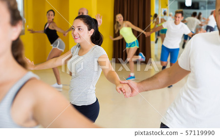 Dancing couples enjoying active swing 57119990