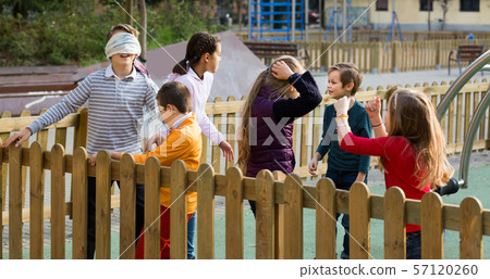 kids playing at Dead man in street kids playing at Dead man in street 57120260
