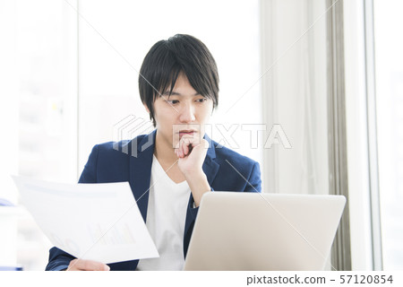 Young man paperwork Young man paperwork 57120854