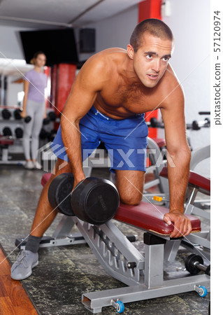 Bare-chested guy doing exercises Bare-chested guy doing exercises 57120974