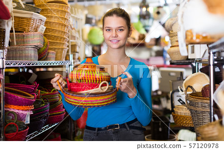 female with multicolor wicker basket female with multicolor wicker basket 57120978