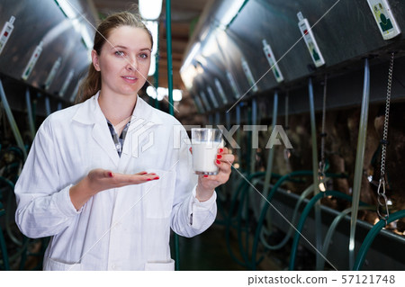 Dairy engineer with glass of milk 57121748