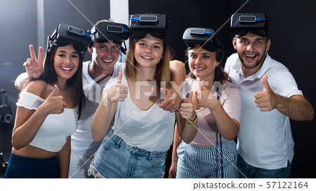 Group of people are wearing virtual reality goggles Group of people are wearing virtual reality goggles 57122164
