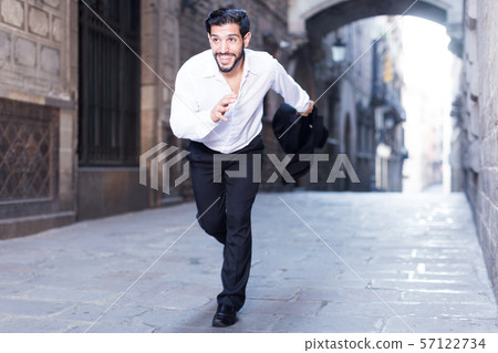 Emotional man in formalwear running Emotional man in formalwear running 57122734