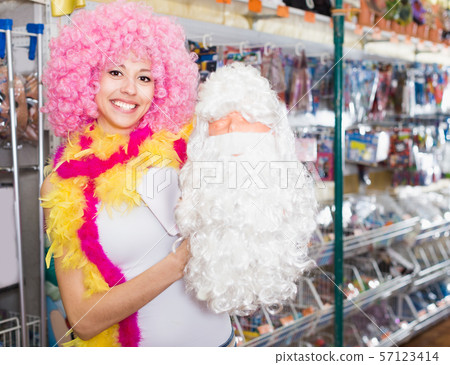 Young smiling woman is shopping 57123414
