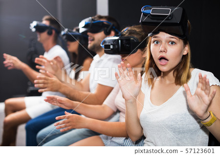 Girl wearing virtual reality goggles Girl wearing virtual reality goggles 57123601