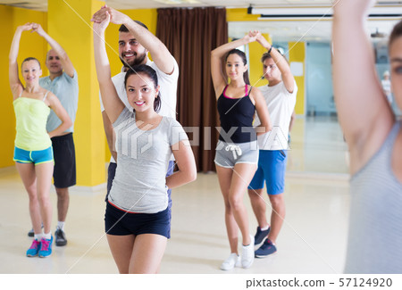 Portrait of happy young people dancing salsa 57124920