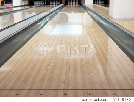 close-up of one empty bowling track lane at close-up of one empty bowling track lane at 57128170