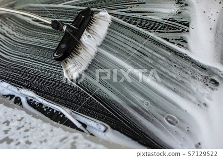 Brush leaving strokes in white shampoo and foam on Brush leaving strokes in white shampoo and foam on 57129522