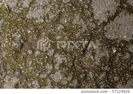 Old rough cracked asphalt background 57129926