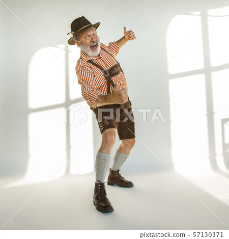 Portrait of Oktoberfest man, wearing the traditional Bavarian clothes 57130371