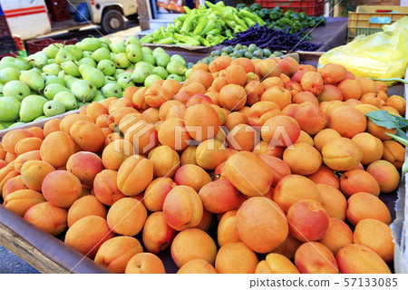 Apricots, pears, peppers, plums are on the market Apricots, pears, peppers, plums are on the market 57133085