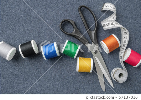 Scissors, measuring tape, multicolored threads. 57137016