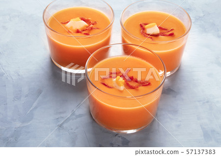 Salmorejo, Spanish cold tomato and bread soup, served in glasses, with copy space Salmorejo, Spanish cold tomato and bread soup, served in glasses, with copy space 57137383