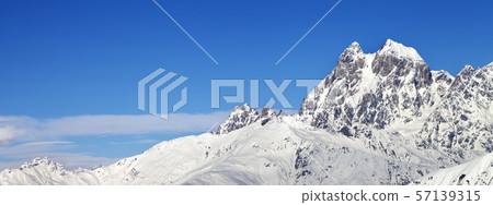 View on Mount Ushba in winter at sunny day View on Mount Ushba in winter at sunny day 57139315