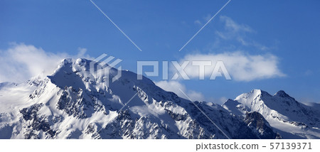 Snowy mountains at nice sunny day Snowy mountains at nice sunny day 57139371