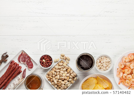 Draft beer and snacks 57140482