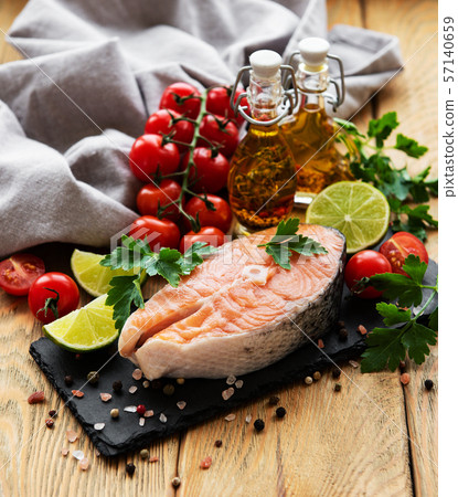 Raw salmon steaks 57140659