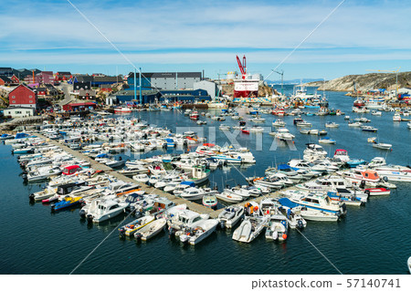 Ilulissat cruise ship harbor and boat harbour on famous Greenland destination. 57140741