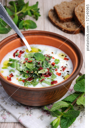 Refreshing summer soup, the rice, mint and yoghurt, spices. Refreshing summer soup, the rice, mint and yoghurt, spices. 57140965