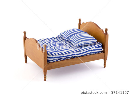 Wooden bed miniature on white background with clipping path Wooden bed miniature on white background with clipping path 57141167