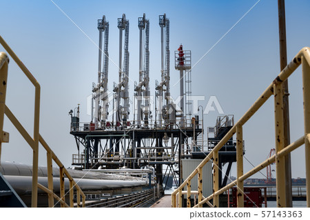 Dedicated wharf for harbor facilities and loading arm for cargo handling 57143363