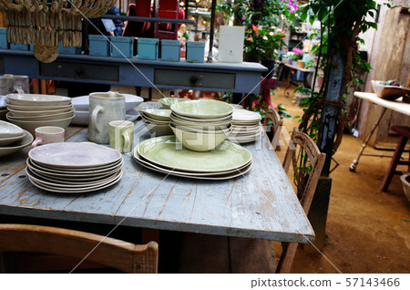 vintage dinning room and table with crockery. vintage dinning room and table with crockery. 57143466