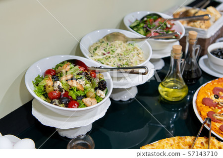 Detail of a beautiful salad buffet with a rich choice, healthy food Detail of a beautiful salad buffet with a rich choice, healthy food 57143710