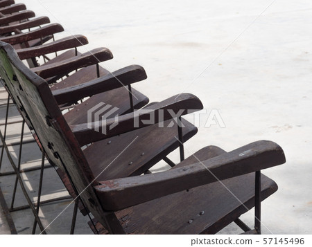 Rows of old wooden chairs Arranged in the middle Rows of old wooden chairs Arranged in the middle 57145496