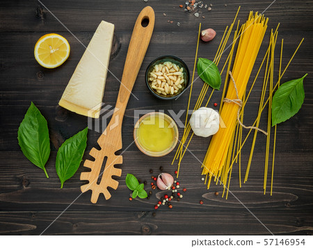 The thin spaghetti on black wooden background. The thin spaghetti on black wooden background. 57146954