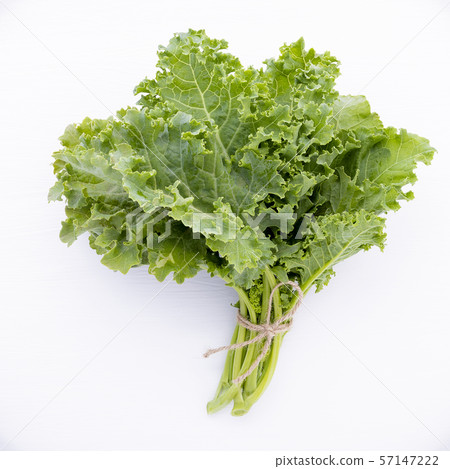 Fresh organic curly kale leaves flat lay on a 57147222
