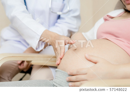 Pregnant Woman and Gynecologist Doctor at Hospital 57148022