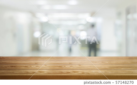 Wood table in modern hospital building interior. Wood table in modern hospital building interior. 57148270