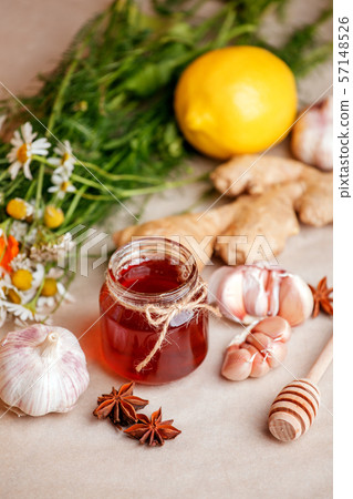 Jar of organic honey, lemon, garlic root, anise, Jar of organic honey, lemon, garlic root, anise, 57148526