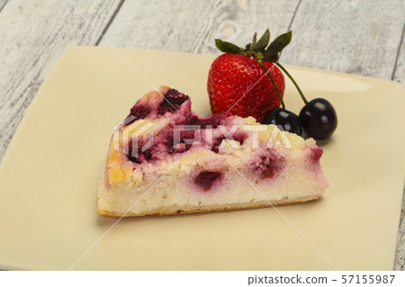 Cheesecake with cherry served strawberry 57155987