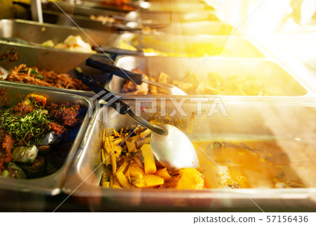 Thai food in pantry shot through mirror. Thai food in pantry shot through mirror. 57156436