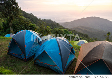 Adventures Camping tourism and tent ,view forest landscape , outdoor in morning and sunset sky at Mon Sone View point , Doi Pha Hom Pok National Park in Chiang Mai, Thailand. Concept Travel. Adventures Camping tourism and tent ,view forest landscape , outdoor in morning and sunset sky at Mon Sone View point , Doi Pha Hom Pok National Park in Chiang Mai, Thailand. Concept Travel. 57156979